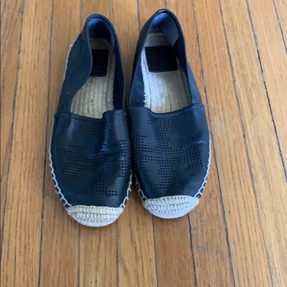 Tory Burch black leather espadrilles.
